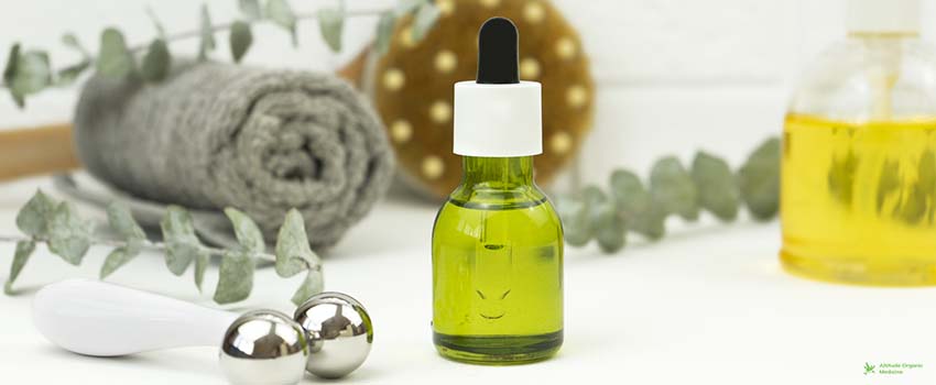 AOC-A CBD green oil, face roller, a brush for dry massage
